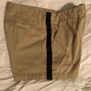 Khaki shorts with Black stripes on side. Size 12